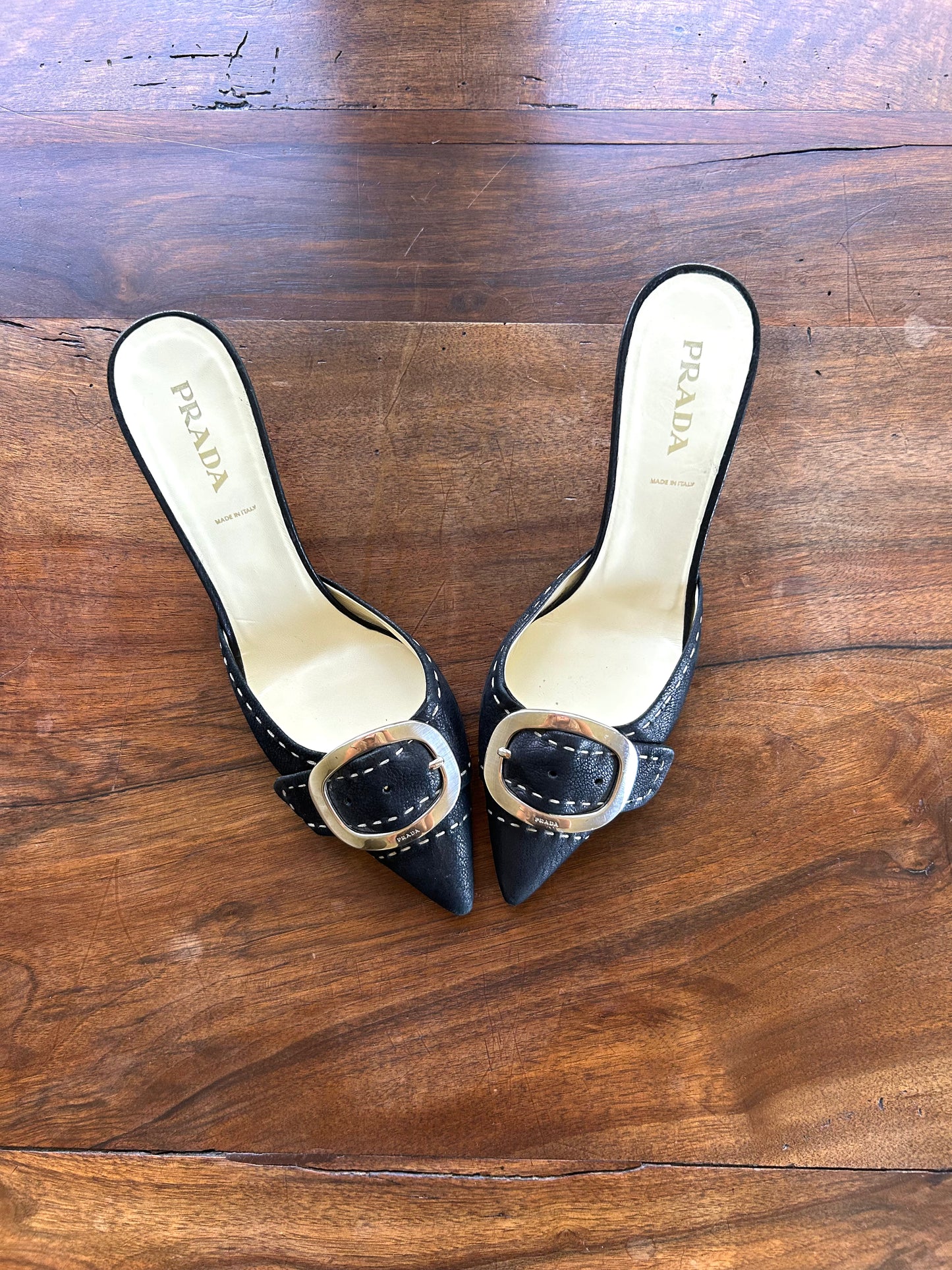 Prada Buckle Leather Mules
